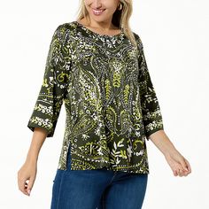 Colleen Lopez Woven Relaxed Fit Printed Top  This easy-breezy woven top features an amazing print that's sure to complement your style. It perfectly pairs with just about any pant, legging or skirt. Stretch Green Printed Top, Spring Stretch Tops With Abstract Print, Green Printed Crew Neck Blouse, Casual Stretch Blouse With Print, Green Fall Vacation Tops, Green Top With Vibrant Print For Fall, Casual Green Top With Bold Print, Casual Green Tops With Bold Print, Patterned Tops With All Over Print For Vacation