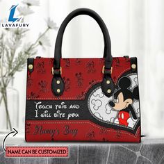 Custom Name I Will Bite You Mickey Mouse Pattern Premium Leather Handbag It’s a practical accessory for fashion-conscious individuals on the go and makes an excellent gift choice for special occasions. The bag is crafted with care and attention to detail, made of high-quality PU leather with a soft microfiber layer that protects your belongings. It features two zippered pockets, one flat pocket, and one detachable pocket, making it ideal for organizing your essentials. The bag is spacious enough Rectangular Bags For Daily Use On Valentine's Day, Mickey Mouse Pattern, Leather Bag Tag, Custom Leather Bag, Small Hand Bags, Bag Names, Mouse Pattern, Personalize Bag, Womens Purses