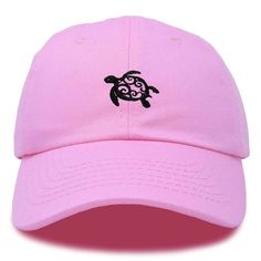 a pink hat with a turtle embroidered on the front