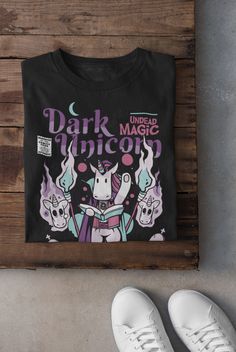 This T-Shirt was designed by Eldritch Curiosities, exclusively for Adventurers and RPG Enthusiasts! Show up to your next role-playing game session in style, wearing the latest in DnD fashion.   All our garments are made to order, using the softest, most premium quality fabrics on the market; with strong seams that hold their shape making it long-lasting. Printed using only high quality inks, resulting in vibrant colors, even after countless washes! Guaranteed to become your favorite! Produced and shipped with the help of our Printing Partners in the USA. We and they are part of an artisan community, responsible for creating thousands of jobs and we thank you for supporting our small business! <3 Oh did we mention we offer FREE SHIPPING WORLDWIDE?! You're Welcome! Favorite our listing and s Dnd Fashion, Dark Unicorn, Geek Gifts For Him, Unicorn Tshirt, Geek Gifts, You're Welcome, Thank You For Support, Funny Meme, Role Playing