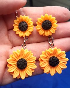 Brighten up your day with these summery resin sunflower stud earrings. Light weight resin material Summer Gift Earrings Made Of Plastic, Flower-shaped Plastic Jewelry As Gift, Plastic Flower-shaped Jewelry For Gifts, Flower Shaped Plastic Jewelry As Gift, Flower-shaped Plastic Jewelry Gift, Plastic Flower-shaped Jewelry As A Gift, Cute Yellow Resin Jewelry, Sunflower Design Drop Earrings For Summer, Yellow Resin Jewelry With Matching Earrings