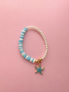 Heishi, Pearl and Starfish detail bracelet Beachy Bracelet Ideas Clay Beads, Clay Bead Bracelet Ideas Starfish, Beach Bracelet Ideas, Beach Bracelets Diy, White Starfish Ocean-inspired Bracelet, Starfish Clay Bead Bracelet, Ocean Clay Bead Bracelets, White Starfish Bracelet With Ocean-inspired Style, Beach Bracelet Shien