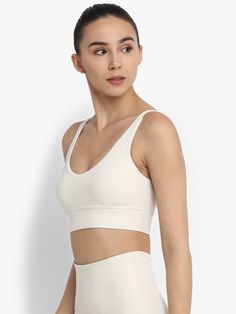 Ivory Inspire Sports Bra White Yoga Sports Bra With Built-in Padding, White Compressive Bra With Light Support, White Compressive Bra, Compressive White Bra, White Compressive Fit Bra, Compressive Seamless White Bra, Compressive White Sports Bra With Removable Pads, White Athleisure Bra For Light Exercise, White Seamless Sports Bra With Wide Straps