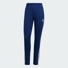 adidas Adicolor SST Track Pants - Blue | Women's Lifestyle | adidas US Adidas Gazelle Shoes, Gazelle Shoes, Adidas Adicolor, Adidas Leggings, Adidas Track Pants, Pants Blue, Women Lifestyle, Adidas Gazelle, Adidas Online