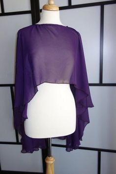 Light weight over dress special occasion shoulder shawl in purple, white and ivory, straight back with side dip for a flattering effect. Material: polyester chiffon blend Color: purple, white, ivory Style: modern, boho Plus sizes available Shoulder Length Veil, Shoulder Shrug, Bridal Bolero Jacket, Shoulder Shawl, Purple Shawl, Outer Dress, Bow Wedding Dress, Mini Wedding Dresses, Bridal Bolero