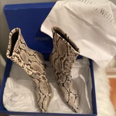 Stuart Weitzman Rapture 75 Bootie Manufacturer Color-Dapple Grey Python Color Looks Almost Brownish/Cream /Greyimpo Mid-Calf Boot Sock Style Boot Angled Mid Heel Pointed Toe Runs Narrow Heel Height: 3.15", 80mm Shaft Height: 7.3" Shaft Circumference: 9.55" Size 9.5 Sock Style, Stuart Weitzman Shoes, Boot Socks, Fashion Socks, Mid Calf Boots, Mid Heel, Shoes Heels Boots, Python, Stuart Weitzman