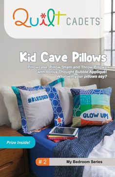 a bed with pillows on top of it in front of a window and the words, kid cave pillows