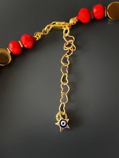 Christmas Evil Eye Necklace I believe every symbol and color has deep meaning and positive energy, and I conveyed that with the design of this necklace.Protective powers of the evil eye combined with the powerful red color. The Evil Eye bead is a prominent symbol in Turkish and many other cultures, and is highly protective. Evil Eye is also called nazar. Evil Eye beads reflect ill intent and jealousy from the 'evil eye' back to the person thinking of it, hence protecting the wearer. They also br Symbolic Gemstone Bead Necklaces For Gifts, Spiritual Beaded Necklace With Heart Beads As Gift, Spiritual Beaded Necklace With Heart Beads For Gift, Handmade Red Carnelian Beaded Necklaces, Spiritual Heart Beads Necklace As Gift, Handmade Good Luck Necklaces With Round Beads, Symbolic Red Round Beads Jewelry, Handmade Red Symbolic Beaded Bracelets, Handmade Good Luck Necklace With Round Beads