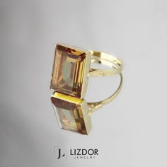 Zultanite Ring 14k Gold Real Rectangle Sultanite Gemstone Ring Color Changing Zultanite Ring Wedding Band Christmas Anniversary Gift ▶ 𝙋𝙍𝙊𝘿𝙐𝘾𝙏 𝙁𝙀𝘼𝙏𝙐𝙍𝙀𝙎 * 14k Solid Gold Ring * Zultanite Gemstone Ring Width: 1.05 cm ( 0.41 inches) * Zultanite Gemstone Ring Lenght: 1.43 cm ( 0.56 inches) * Zultanite Gemstone Ring Height: 6.21 mm ( 0.24 inches) - Our Zultanite ring is real and natural stone. You can tell from the color change that it is original. It is not lab made. Zultanite stone i Modern Topaz Ring With Rectangular Stone For Formal Occasions, Elegant Topaz Rings With Rectangular Stone, Modern Formal Topaz Ring With Rectangular Stone, Gold Jewelry With Rectangular Accent Stones, Gold Jewelry With Rectangular Stone For Formal Occasions, Gold Jewelry With Rectangular Stone For Formal Events, Formal Gold Jewelry With Rectangular Stone, Faceted Topaz Wedding Rings, Modern Citrine Jewelry For Wedding