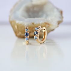 Genuine Ombre Blue Sapphire Gemstones 3 Stones Huggie Hoops/ Solid 14k Yellow Gold Earrings. Great Gift For Mom, Sister, Friend, Girlfriend and Daughter. Also available in Rose Gold, White Gold and Yellow Gold. *Product info: ★Details ★ SKU Code : 2554 ★Purity : Solid 14k Gold ( Also available in 9k & 18k Solid Gold) ★Metal : Yellow Gold ( Also available in Rose Gold & White Gold) ★Gemstone : 100 % Genuine Blue Sapphire ( Also available in Other Gemstone) ★Stone Shape : Round ( Also available in Sapphire Earring, Gold Jhumka, Gold Jhumka Earrings, Earring Minimalist, Friend Girlfriend, Great Gifts For Mom, Jhumka Earrings, Sapphire Earrings, Yellow Gold Earring