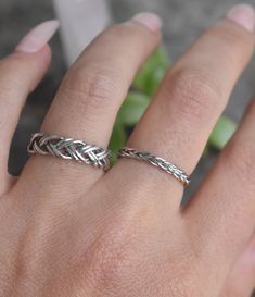 Minimalist Braid Band:-.925 solid sterling silver-2.3mm width braid band-US sizes 4-12.5 with half sizes.-Photos with double braid for size comparison-please note video depicts the double braid underneath the single for comparison. Ty!Connect with us on Instagram @a_wild_violet for sales and giveaways!**All items are in stock and ship within 2-5 business days from received payment (excluding Saturday/Sunday) from the US. If you are within the US please expect 3-7 business days for shipping trans Braided Sterling Silver Jewelry, Sterling Silver Braided Silver Jewelry, Sterling Silver Braided Jewelry In Silver, Rope Ring, Rope Rings, Double Braid, Braided Ring, Celtic Rings, Stack Ring