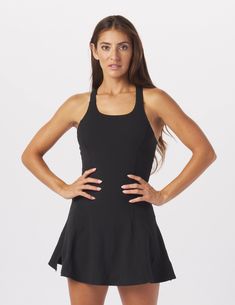 A dress that's made to move in! The Full Force dress is all about function, support, and fashion! Thick crossover straps, maximum support bra and built-in shorts keep everything in place, and a fit and flare A-line silhouette maximizes comfort and flattering style. 32" length. We recommend sizing up for this dress. Sporty Fitted Dress With Built-in Shorts, Workout Dress With Built-in Stretch Shorts, Fitted Sleeveless Tennis Dress With Built-in Bra, Sporty Mini Dress With Built-in Bra For Workout, Stretch Sleeveless Dress With Built-in Shorts, Black Sleeveless Tennis Dress With Built-in Bra, Black Tennis Dress With Built-in Bra, Workout Dresses With Built-in Shorts, Black Tennis Dress With Built-in Bra For Summer