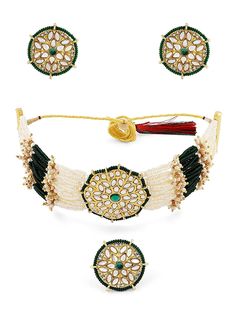 Welcome to Adornn Jewels This Choker jewellery set consists of a necklace, finger ring and a pair of earrings Gold-plated necklace has Green KUndan and Beads details Secured with a drawstring closure A matching pair earrings, each secured with a post-and-back closure Gold-plated adjustable finger ring  Size & Fit Length of the Necklace : 44 cm Length of the Earring : 3 cm Diameter of Finger ring: 2 cm(Adjustable) Material & Care Material: Alloy Plating: Gold-plated Stone type: Kundan & Beads Car Festive Adjustable Kundan Necklace For Diwali, Bollywood Style Choker For Diwali Gift, Kundan Hand-set Round Choker, Hand Set Kundan Choker, Kundan Choker With Hand Set Design, Chandbali Hand Set Choker For Festivals, Adjustable Cutdana Party Jewelry, Festive Choker For Celebration, Festive Celebration Choker