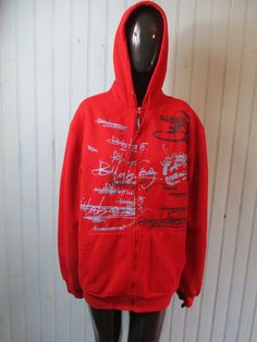 Vintage Billabong hoodie in bright red with grey graphics.  It has a front zip and two pockets, very good condition. Dimensions: Chest: 44 Inches. Inside arm: 21 Inches. Length: 28 Inches Made by BILLABONG Sporty Hoodie With Screen Print For Streetwear, Sporty Streetwear Hoodie With Screen Print, Red Cotton Hoodie With Kangaroo Pocket, Cotton Hooded Jacket For Streetwear, Vintage Sweatshirt With Kangaroo Pocket For Streetwear, Red Cotton Hip Hop Hoodie, Vintage Hoodie With Adjustable Hood For Streetwear, Sporty Hooded Hoodie With Screen Print, Red Hip Hop Sweatshirt With Drawstring Hood