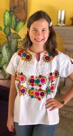 Mexican blouse, blouse with clips and fine embroidery, handmade blouse, blouse with multicolored floral embroidery, ethnic blouse, blouse of blanket. The embroidery of each blouse is unique so it may vary. This blouse is one size and fits S/M Mexican textile art has centuries of history and creativity throughout the country. Mexico is recognized as one of the leading countries with a beautiful aristic production in the textile world, miraculous hands of talented artisans from different states of Multicolor Summer Blouse For Fiesta, White Bohemian Top For Cinco De Mayo, Multicolor Embroidery Blouse For Summer Fiesta, Folk Style Floral Print Tops For Festivals, Multicolor Embroidered Blouse For Summer Fiesta, Folk Style Blouse With Floral Print And Short Sleeves, Bohemian Short Sleeve Blouse For Fiesta, Cinco De Mayo Short Sleeve Blouse, White Top For Spring Fiesta