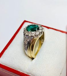 Beautiful Vintage 14k Yellow Gold Natural Oval Shape Emerald Ring 100% Natural Emeralds Emerald(s) 1.00CT Diamond: 0.80CT Color: G Clarity: SI1 Total ring weight: 5.2GR Ring sizing available free of charge For more information regarding this item feel free to reach me so I can accommodate your needs. Thank you Exquisite Oval Emerald Ring In Yellow Gold, Formal Yellow Gold Oval Cabochon Diamond Ring, Luxury Oval Hallmarked Emerald Ring, Elegant Oval Emerald Ring For Formal Occasions, Elegant Green Signet Ring For Anniversary, Fine Jewelry Hallmarked Oval Emerald Ring, Oval Hallmarked Emerald Ring Fine Jewelry, Vintage White Gold Oval Emerald Ring, Vintage Oval White Gold Emerald Ring