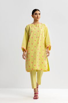 Yellow Cotton Kurta With Dabka, Yellow Cotton Kurta With Dabka Detail, Yellow Cotton Kurta With Dabka Embroidery, Yellow Cotton Kurta With Printed Motifs, Festive Yellow Cotton Sets, Pista Green Kurta With Printed Motifs For Spring, Yellow Cotton Long Sleeve Sets, Yellow Long Sleeve Sets For Summer, Summer Yellow Long Sleeve Sets