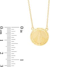 Celebrate her faith with this gleaming Virgin Mary medallion necklace. Fashioned in warm 10K gold, this thoughtful style showcases a traditional miraculous medal design gleaming with the profound "O Mary conceived without sin pray for us who have recourse to thee." On the back, the symbolic details are certain to be appreciated. Polished to a bright shine, this look suspends centered along a 17.0-inch cable chain that secures with a spring-ring clasp. Gold Miraculous Medal Round Pendant Jewelry, Gold Round Pendant With Miraculous Medal, Miraculous Medal Medallion Necklace For Commemoration, Miraculous Medal Medallion Necklaces For Commemoration, Miraculous Medal Medallion Necklace, Yellow Gold Necklace With Miraculous Medal Round Pendant, Yellow Gold Necklace With Miraculous Medal, Miraculous Medal For Commemoration, Commemorative Jewelry With Miraculous Medal