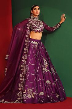 Editor's Note Grapevine lehenga in raw silk base with attached cancan and floral embroidery all-over. Comes with embroidered padded blouse and embroidered dupatta with hand made tassels. Fabric: Raw Silk, organza, shantoon Color: Purple Components: Lehenga, blouse and dupatta Occasion: Sangeet Care: Dry clean only About the Designer Mahima Mahajan has injected a breath of fresh air into the Indian fashion industry with her bespoke collection of decorous designs. Her approach to designing can be Lehenga Choli For Kids, Long Lehenga, Simple Lehenga Choli, Lehenga Choli Design, Mahima Mahajan, Lehenga Style Saree, Kids Lehenga Choli, Indian Bridesmaid Dresses, Blouse Lehenga