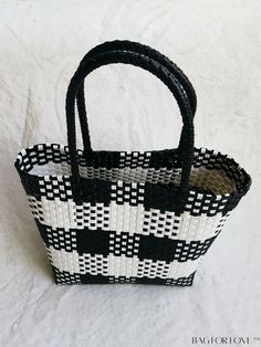 BagForLove - Versatile Plaid Square Tote Bag: Perfect for Casual Outings, Beach Vacations, and Shopping Product Description Color Black Type Straw Bag Strap Type Double Handle Pattern Type Plaid Features High-capacity Closure Type No-closure Composition 100% Polyvinyl Chloride Material PE Size Chart INCH CM Handle Height 7.1 inch Handle Height 18 cm Details Pictures Similar Products h2 { text-align: center; } /* æ¢è¡ */ li{ white-space: normal; word-break: break-all; word-wrap: break-word; } .red-box { width: 100%; display: flex; flex-direction: row; flex-wrap: wrap; justify-content: center; } .red-box > div { width: 190px; height: 250px; margin: 10px; } .red-box > div > a > img { width: 190px; height: 250px; } .size-box { width: 100%; margin: auto; white-space: nowrap; } .table { border Black Handheld Bags For Vacation, Black Handheld Bag For Vacation, Black Handheld Vacation Bags, Black Bucket Straw Bag For Vacation, Casual Black Bucket Beach Bag, Large Capacity Black Straw Beach Bag, Large Capacity Black Straw Bag For Travel, Casual Black Straw Bag With Adjustable Strap, Large Capacity Black Straw Travel Bag