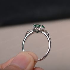 This is a gorgeous handmade creation, a combination of beauty, simplicity & Elegance. The 7*7mm round cut lab emerald is crafted in solid sterling silver and with rhodium plated. 14K white gold/rose gold/yellow gold available as well,pls contact me if you need. All item is sent in a beautiful gift box You can realize more lovely stuff clicking the link https://www.etsy.com/shop/knightjewelry?refshopsection_shophome_leftnav Please leave the correct address and you phone number for delivering Dainty Round Emerald Promise Ring, Emerald Cluster Ring For Promise, Round Cut, Wedding Emerald Ring In 14k White Gold, Elegant Emerald Ring With Bezel Setting, Dainty Round Emerald Ring For Anniversary, Elegant Green Round Rings, Fine Jewelry Emerald Promise Ring, Timeless Emerald Ring With Accent Stones For Promise, Exquisite Emerald Promise Ring