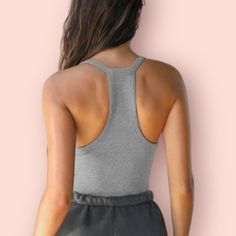 This piece features a blend of sheer and opaque fabric for a classic yet stylish look. With a moderate stretch and 95% polyester and 5% spandex material composition, it offers both comfort and durability. It is available in sizes S to XL with precise bust and top length measurements for the perfect fit. Easy care instructions: machine wash cold and tumble dry low. Casual Stretch Tank Top With Mesh Back, Stretch Mesh Back Racerback Top, Solid Scoop Back Top For Sports, High Stretch Yoga Top With Scoop Back, Basic Solid Color Elastane Tank Top, Tops With Built-in Bra And Scoop Back, Summer Scoop Back Seamless Top, Sporty Stretch Top With Scoop Back, Trendy Scoop Neck Sports Top