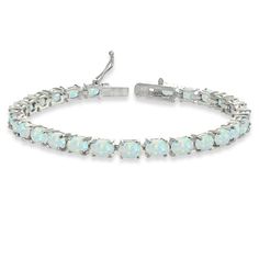 PRICES MAY VARY. Feature - Express your style and elegance with this classic tennis bracelet. This stunning bracelet features dazzling 6x4mm oval-cut gemstones, for a chic and trendy look Crafted - The bracelet is crafted of fine sterling silver. It measures 7.25 inches and secures with a box and tongue with a safety latch Care - Keep from water cosmetics & chemical product. Clean with microfiber cloth Packaging - Jewelry packaged with a nice box ready for gifting About – Our jewelry collection White Gold Oval Tennis Bracelet Gift, White Gemstone Tennis Bracelet, Adjustable Oval Fine Jewelry Bracelet, White Tennis Bracelet Bangle As Gift, White Tennis Bangle Bracelet As Gift, White Tennis Bangle Bracelet For Gift, White Tennis Jubilee Bracelet As A Gift, White Sterling Silver Tennis Bracelet As Gift, White Oval Bracelets In Fine Jewelry Style