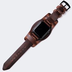 This flat, stitchless design complements the minimal look of Apple Watch series. Single layered leather watch strap with bund piece. Originally crafted for German aviators during WW2, the bund strap features an extra piece of leather within that protects the wearer's wrist from extreme temperatures. When the extra piec Brown Leather Watch Band With Adjustable Strap, Timeless Adjustable Leather Watch Band, Modern Brown Watch Band With Adjustable Strap, Modern Brown Watch Bands With Adjustable Strap, Business Leather Apple Watch Band, Adjustable Leather Watch Bands For Business, Leather Wrist Strap For Watches, Everyday Use, Modern Brown Watch With Wrist Strap, Leather Watch Accessories With Wrist Strap For Everyday