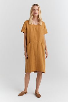 Take your fashion sense to a whole new level with this Simple Casual Linen dress with pockets. This fantastic linen shirt dress is a mix of old and new! With 10+ different colors, this dress can look great with any accessories. D E S C R I P T I O N * A-line silhouette * Flax fit * Elegant boat neckline * Short sleeves * Front two pockets * The knee-length D E T A I L S * Sizes: XS - XXL * 100% linen * European soft and washed linen fabric (weight 206 g/m² | 6.49 oz/yd²). Fabric is woven accordi Solid Color Shift Midi Dress With Pockets, A-line Dress With Pockets For Daywear, Shift Midi Dress With Pockets, Shift Dress With Pockets For Work, Solid Color Knee-length Dresses With Side Pockets, Daywear A-line Dress With Pockets, Solid Knee-length Dress With Pockets, Knee-length Dress With Pockets, Solid Color A-line Dress With Pockets