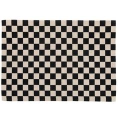 a black and white checkered rug on a white background