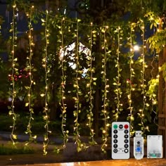 PRICES MAY VARY. 12 strands of artificial ivy lights (each green vine is nearly 7 feet long， with 80 green leaves decor， total length 84 feet， with hanging hole design) ; curtain lights for backdrop:9.4 feet * 6.2 feet (length * drop length) ， 12 light strings (20 LED lights per string)，240 warm white LED lights in tota 8 Modes fairy lights for bedroom - Includes a remote for switching between 8 modes， dimming and setting a 6 hour timer. You can change modes using the remote or by pressing a swi Fairy Curtain Lights, Christmas Light Curtains, Waterfall Lights, String Lights In The Bedroom, Hanging String Lights, Hanging Christmas Lights, Led String Lights Outdoor, Led Curtain Lights, Led Curtain