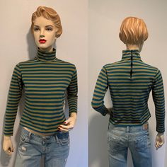 Early 1970's Vintage Shirt ~ Olive Green And Blue Striped Shirt, Nylon, Long Sleeves, Zips Up The Back, Very Good Condition, Size Small It has a tiny mend under one arm,  where the thread came undone.  it was mended now it's great. .   I will be mailing this Priority Mail.   Measurements  Bust ~ 36  Inch  Waist ~ 34 Inch Shoulder To Shoulder ~ 15 Inch Sleeve ~ 18 Inch Length ~  20 Inch Retro Stretch Long Sleeve Tops, Retro Blue Tops For Fall, Blue Retro Tops For Fall, Blue Retro Fall Tops, Retro Stretch Top For Fall, Retro Fitted Tops For Fall, Fitted Retro Tops For Fall, 1970s Cotton Tops For Fall, 1970s Style Cotton Tops For Fall