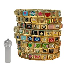 PRICES MAY VARY. You will receive a unique Gold Italian Bracelet and 1 thumb charms tools, choose the appropriate quantity and pattern according to your own size and preferences, and we will help you assemble it into a bracelet based on the charms you choose. Easily open and close Italian charm links to customize your own unique bracelet. The charms have retractable snaps inside, making it effortless to load and unload them. It can complete the stitching of all 9mm accessories and can be interchanged and combined with other Italian Charms Compatible with other major brand Italian charms too. By DIYing Italian charms with your loved ones, you not only create a beautiful bracelet but also share enjoyable moments together. How to buy: 1. Select the quantity you want to buy. 2. Fill in your ch Gold Italian Charm Bracelet, Italian Charm Bracelet Gold, How To Make Pins, Italian Bracelet, Italian Charms, Diy Jewelry Gifts, Diy Charm Bracelet, Jewelry Accessories Ideas, Dope Jewelry