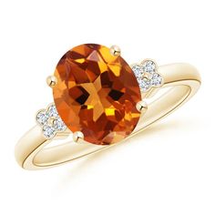 This citrine solitaire ring in 14k yellow gold evokes elegance and femininity. The prong set oval citrine fascinates with its delightful yellow-golden hue and accentuated with glittering diamond accents in bezel settings. Gold Sign, Diamond Glitter, Ring With Diamond, Citrine Ring, Solitaire Ring, 18k Rose Gold, Prong Setting, Citrine, Gemstone Jewelry