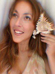 Hand sculpted blooms paired with enchanting opulence shells. An effortless resort vibe captured in an earring! Seashell Earrings, Book Gifts, Sea Shells, Floral