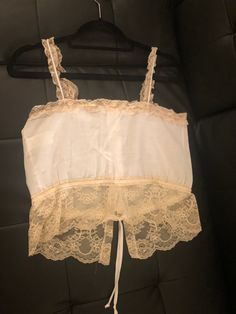 Gorgeous JC Penny Vintage lingerie tank. Excellent condition. Still trying to determine year. Fitted Sleeveless Tank Top With Delicate Lace, Fitted Sleeveless Tank Top With Lace Bodice, Sheer Fitted Cami Lace Top, Fitted Sheer Lace Camisole Top, Fitted Tank Lace Top With Delicate Lace, Fitted Sheer Lace Cami Top, Fitted Lace Bodice Sleeveless Tank Top, White Camisole With Contrast Lace, Summer Sleeveless Camisole With Contrast Lace