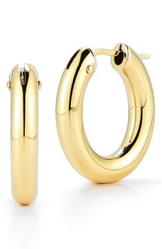 Lightweight and incredibly versatile, these sculptural hoop earrings are finely crafted from gleaming 18-karat gold. Style Name:Roberto Coin Oval Hoop Earrings. Style Number: 6095141. Available in stores. Fine Jewelry Oval Hoop Earrings With Polished Finish, Oval Polished Hoop Earrings Fine Jewelry, Timeless Oval Hoop Earrings With Polished Finish, Oval Hoop Earrings With Polished Finish, Modern Yellow Gold Oval Link Hoop Earrings, Modern Oval Hoop Earring Sold Individually, Formal Oval Huggie Earrings With Polished Finish, Formal Oval Polished Huggie Earrings, Luxury Small Hoop Earrings With Polished Finish