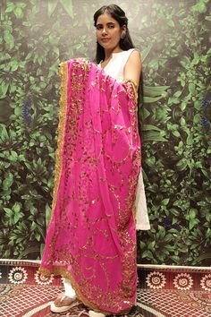 Description Add a touch of elegance to your outfit with our Beautiful Pink Color Copper Gota Patti work Dupatta for Women . Made with high-quality materials and exquisite craftsmanship, this dupatta is perfect for any occasion. The beautiful pink color and intricate gota patti work will surely make you stand out in the crowd. Elevate your style with this stunning dupatta. About Fabric Georgette Length 2.5 Meter Pattern Emborided Care instructions Dry Clean Only Embroidery type Gota patti & Threa Pink Anarkali Churidar With Dupatta, Pink Bollywood Traditional Wear With Zari Work, Traditional Pink Salwar Kameez With Mirror Work, Pink Semi-stitched Anarkali Set With Dupatta, Semi-stitched Bollywood Traditional Wear In Pink, Pink Bollywood Lehenga With Dabka Work, Bollywood Style Pink Lehenga With Dabka Work, Pink Dori Work Anarkali Set For Festivals, Festive Pink Salwar Kameez With Mirror Work