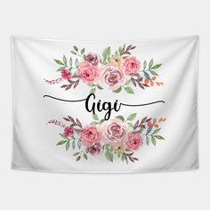 a white wall hanging with pink flowers and the word gigi in cursive writing