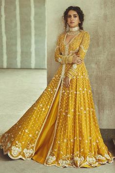 Golden yellow anarkali with floral embroidered motifs and mirror work detail. Paired with dupatta.
Component: 2
Embroidered
Neckine: V neck
Sleeve Length: Full
Fabric:  Georgette, Net
Color: Yellow
Floral motif work
Back cutout - Aza Fashions Yellow Anarkali, Saree Function, Anarkali Designs, Anarkali With Dupatta, Half Saree Function, Ridhi Mehra, Haldi Outfits, Haldi Outfit, Sanya Malhotra