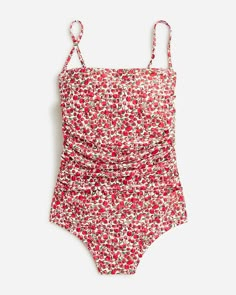 Ruched bandeau one-piece swimsuit in Liberty® Eliza's Red fabric Bandeau Ruched Swimwear For Sunbathing, Ruched Bandeau Swimwear For Sunbathing, Strapless Ruched Swimwear For Sunbathing, Red Fitted Swimwear With Spaghetti Straps, Strapless Ruched Nylon Swimwear, Spring Nylon Swimwear With Spaghetti Straps, Ruched Swimwear With Spaghetti Straps For Sunbathing, Nylon Ruched Swimwear With Spaghetti Straps, Ruched Spaghetti Strap Swimwear For Sunbathing