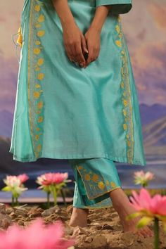 Turquoise silk chanderi kurta with floral and zari embroidery. Comes with pant. - Aza Fashions Bollywood Style Tussar Silk Palazzo Set With Embroidered Border, Traditional Tussar Silk Palazzo Set With Embroidered Border, Blue Chanderi Anarkali Set With Embroidered Border, Green Silk Churidar With Embroidered Border, Green Silk Embroidered Churidar, Eid Tussar Silk Churidar With Embroidered Border, Festive Tussar Silk Churidar With Embroidered Border, Festival Blue Palazzo Set With Embroidered Border, Blue Raw Silk Salwar Kameez With Embroidered Border