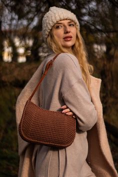 This ginger color saddle bag Loran is made of polyester cord with with leather sidewall, strap and zipper on the leather. Closes with zipper on the leather.  Dimensions: ✶ Length 28 cm ✶ Width 17 cm ✶ Depth 6 cm ✶ Shoulder strap - 63-73 cm You can order this bag in the colors of your choice. I will choose the color of the cord for the color of the leather set. The term of making a bag to order is 7-14 days Light Brown Woven Shoulder Bag For Travel, Travel-friendly Woven Light Brown Shoulder Bag, Travel Light Brown Woven Shoulder Bag, Brown Straw Shoulder Bag For On-the-go, Light Brown Crochet Shoulder Bag For Travel, Brown Hobo Bag With Braided Handles For On-the-go, Brown Straw Shoulder Bag With Leather Trim, Brown Woven Leather Shoulder Bag For Travel, Brown Woven Shoulder Bag For Everyday