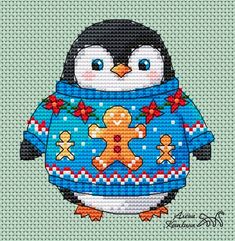 a penguin wearing a sweater with a gingerbread cross stitched on it's chest