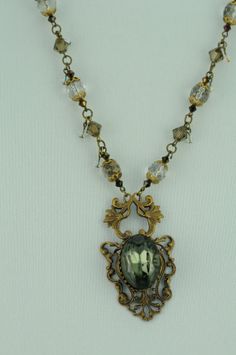 Ornate Vintage Crystal Necklace with Antique by MonforteJewelry, $200.00 Grunge Jewelry Necklaces Crystal, Vintage Necklace Aesthetic, Vintage Necklace Antiques, Grunge Necklace, Grunge Jewelry, Vintage Pendant Necklace, Smokey Topaz, Topaz Pendant, Gothic Clothing