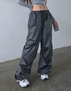 Best paired with a crop top and sneakers Perfect for the gym Great for casual and sporty looks Adjustable waist Athleisure Drawstring Pants For Gym, Athleisure Gym Pants With Drawstring, Baggy Athleisure Joggers, Sporty Nylon Pants With Drawstring, Sporty Gym Pants With Drawstring, Workout Pants With Drawstring, Baggy Solid Color Athleisure Activewear, Solid Color Baggy Athleisure Activewear, Gray Drawstring Workout Bottoms