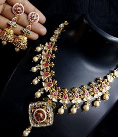 Kundan Meenakari Necklace/Kundan Temple Jewelry/South Indian Kundan Necklace/Indian Jewelry/Pakistani/Bollywood/Traditional/wedding jewelry Traditional Kundan/Polki/Meenakari Necklace Set Handcrafted To Perfection Light Weight Perfect For Indian Weddings And Celebrations This necklace comes with an adjustable string at the back for comfortable fitting around the neck. Earrings: 2.5 Inches Long Necklace: Adjustable Length Earrings come with push back closure -------------------------------------- Luxury Kundan Temple Necklace With Meenakari, Luxury Zari Work Temple Necklace For Diwali, Luxury Temple Necklace For Navratri Celebration, Ornate Meenakari Necklaces For Puja, Ornate Meenakari Necklace For Puja, Ornate Meenakari Temple Necklace For Puja, Ornate Temple Necklace With Meenakari For Puja, Ceremonial Meenakari Temple Jewelry Sets, Ornate Kundan Necklace For Puja