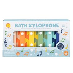 a box of bath xylophones with music notes on them in different colors