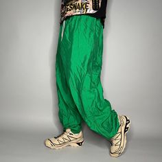 "Vintage Track Pants Kelly Green Nylon Joggers Elastic Cuffs has Ankle Zippers 90s Skate / Streetwear Great Condition: 9/10 Men's Size: 2X-Large My Hands in Pockets = It has Pockets No Hands in Pockets = Does Not Have Pockets Drawstring Will be Visible in Forward Pic, if not Visible it Does Not Have a Drawstring About me: I am 6' 0\" for reference I generally wear a Large (32\" inseam) I Model XS to 2XL sweatpants, I find that you can often size up or down with 95% of sweatpants and they fit the same" Vintage Track Pants, Hands In Pockets, 90s Skate, No Hands, Vintage Kelly, Track Pants Mens, Skate Streetwear, Kelly Green, Mens Trousers