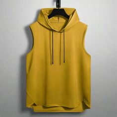 Level Up Your Workout Gear: Quick-Dry Sleeveless Hoodie Take your workouts to the next level with this functional and stylish sleeveless hoodie. Featuring a quick-dry polyester blend, it keeps you cool and dry during even the most intense activities. Performance-Ready: The quick-dry fabric wicks away moisture and dries fast, keeping you comfortable during exercise. Unrestricted Movement: The sleeveless design allows for full range of motion, perfect for any workout. Hooded Style: The attached ho Athleisure Sleeveless Tops For Streetwear, Sleeveless Athleisure Tops For Streetwear, Athleisure Sleeveless Streetwear Top, Functional Sleeveless Vest For Streetwear, Sleeveless Sportswear Vest For Streetwear, Sportswear Vest For Streetwear, Breathable Sleeveless Top For Streetwear, Breathable Sleeveless Streetwear Top, Functional Gym Tops With Drawstring Hood